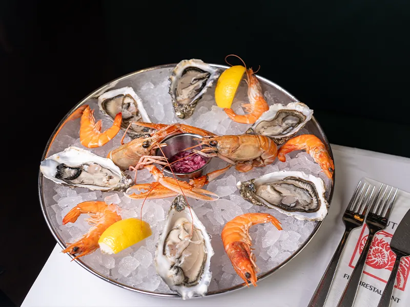 Oyster and prawn platter on ice