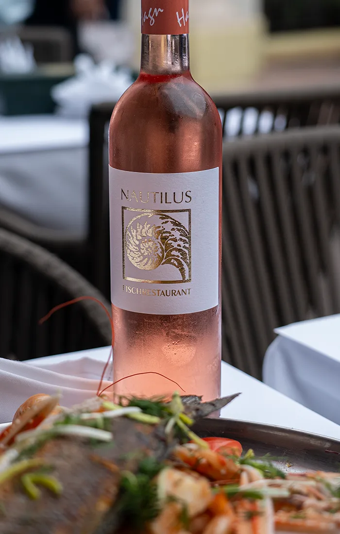 Nautilus rosé edition on a table in the garden