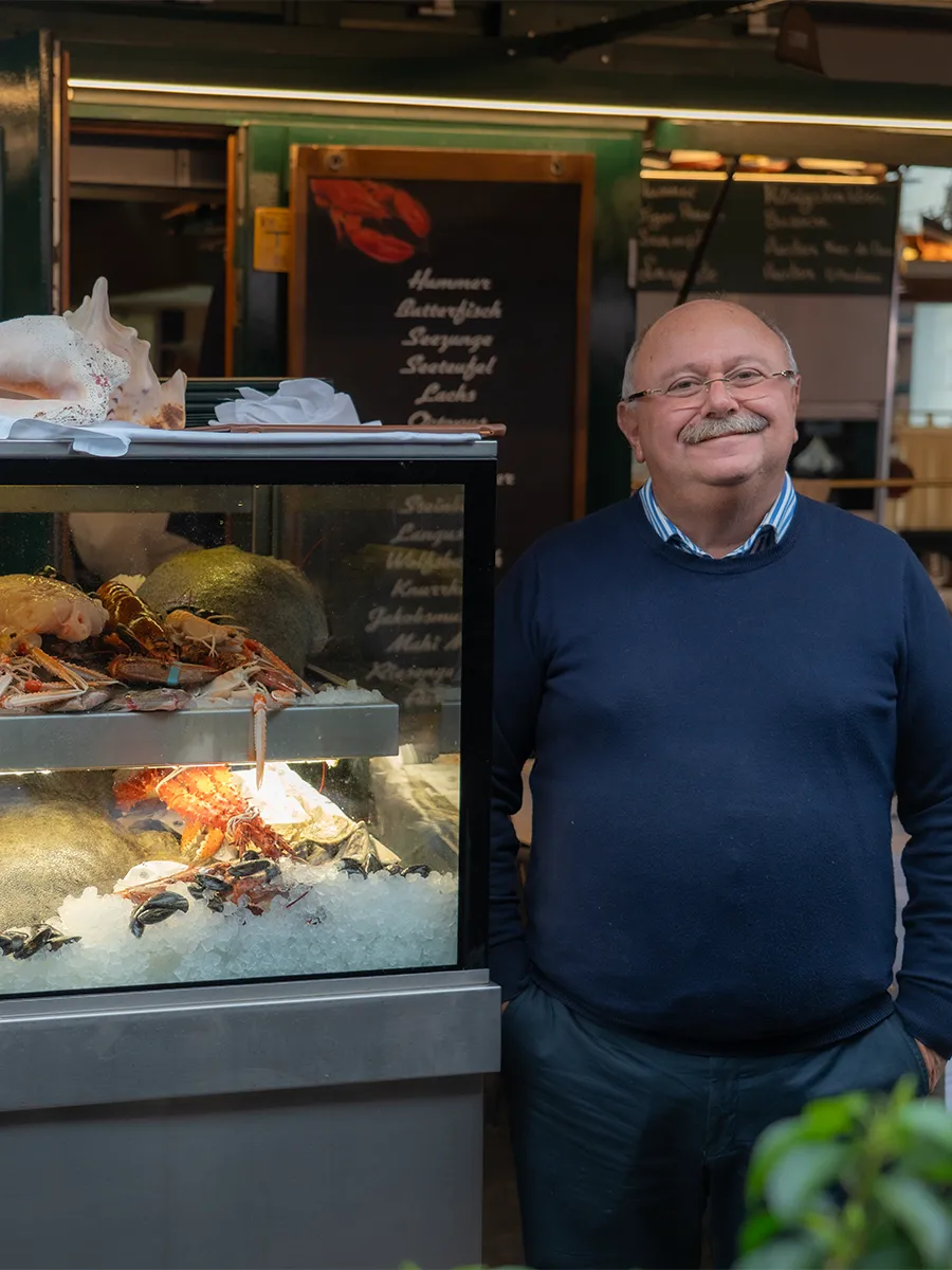 Owner Sabu Topallar at the fish display of his restaurant Nautilus at Vienna's Naschmarkt